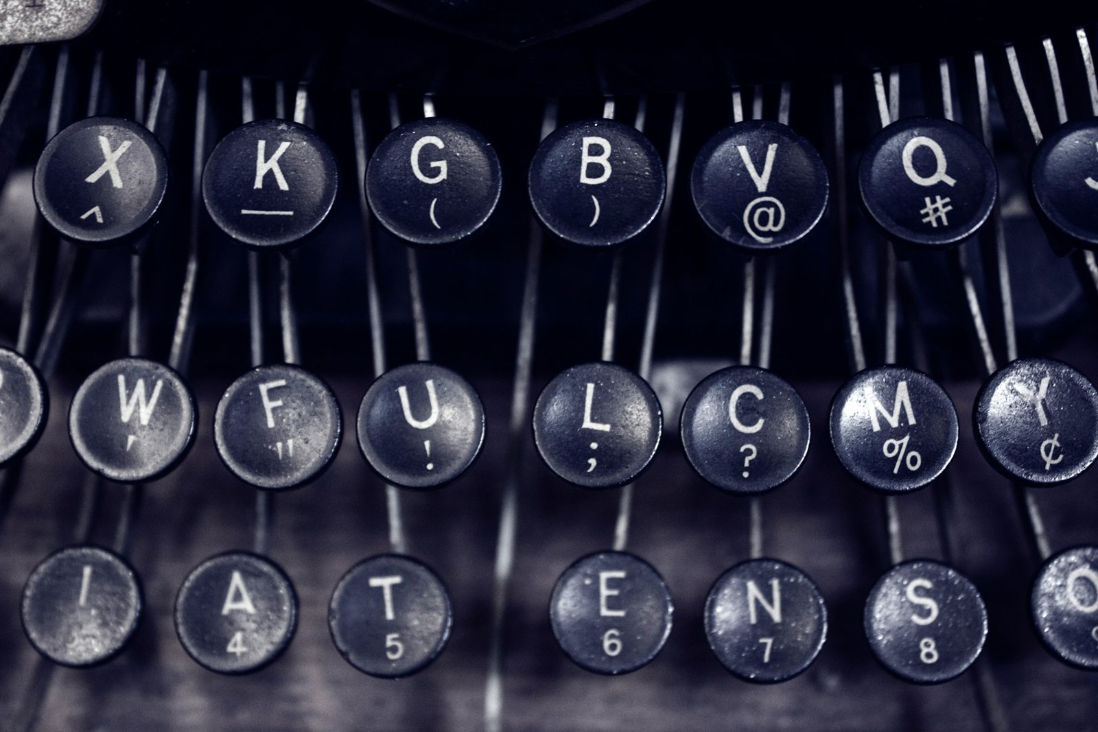 The keys of a typewriter, close in.